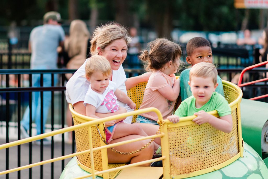 A family plays together at Kiddie Park